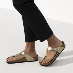 Birkenstock Women's Gizeh Birko-Flor In Gold -sorel shop 1016108 f closeup f 1100x